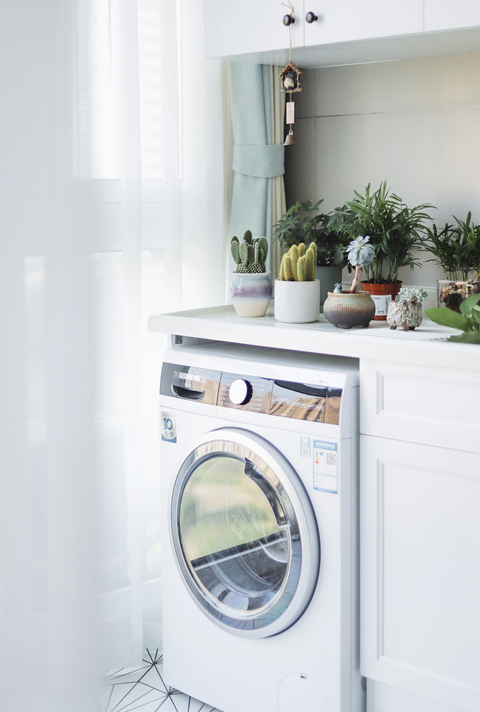 LG front-load washing machine in a bright laundry space — professional appliance repair